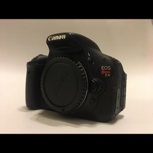 Canon T3i w/ 3 lens + Battery Pack + Lens Filters